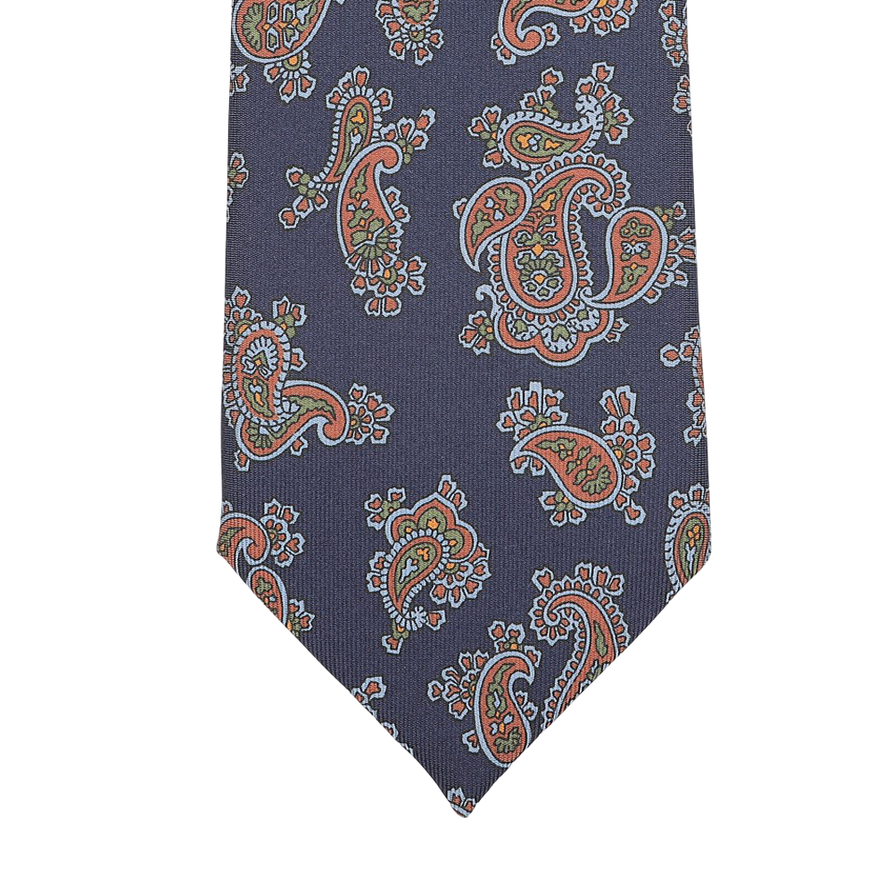 Introducing the Navy Blue Paisley Printed Silk Tie by Seaward & Stearn, a finely handcrafted accessory made in England that features a stunning pattern of navy blue intertwining with vibrant red, blue, and green hues.