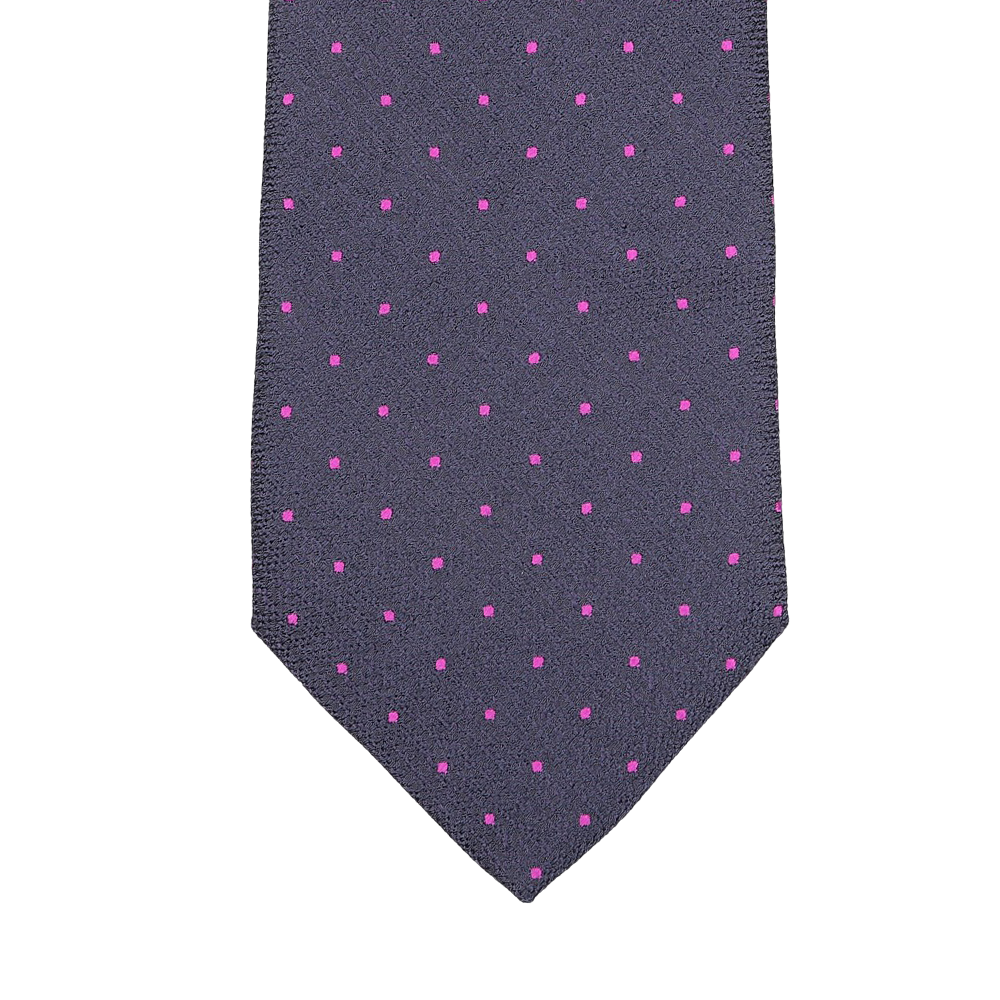 Close-up of a silk tie by Seaward & Stearn in a rich navy blue hue, featuring tiny pink dots woven into an elegant pattern.