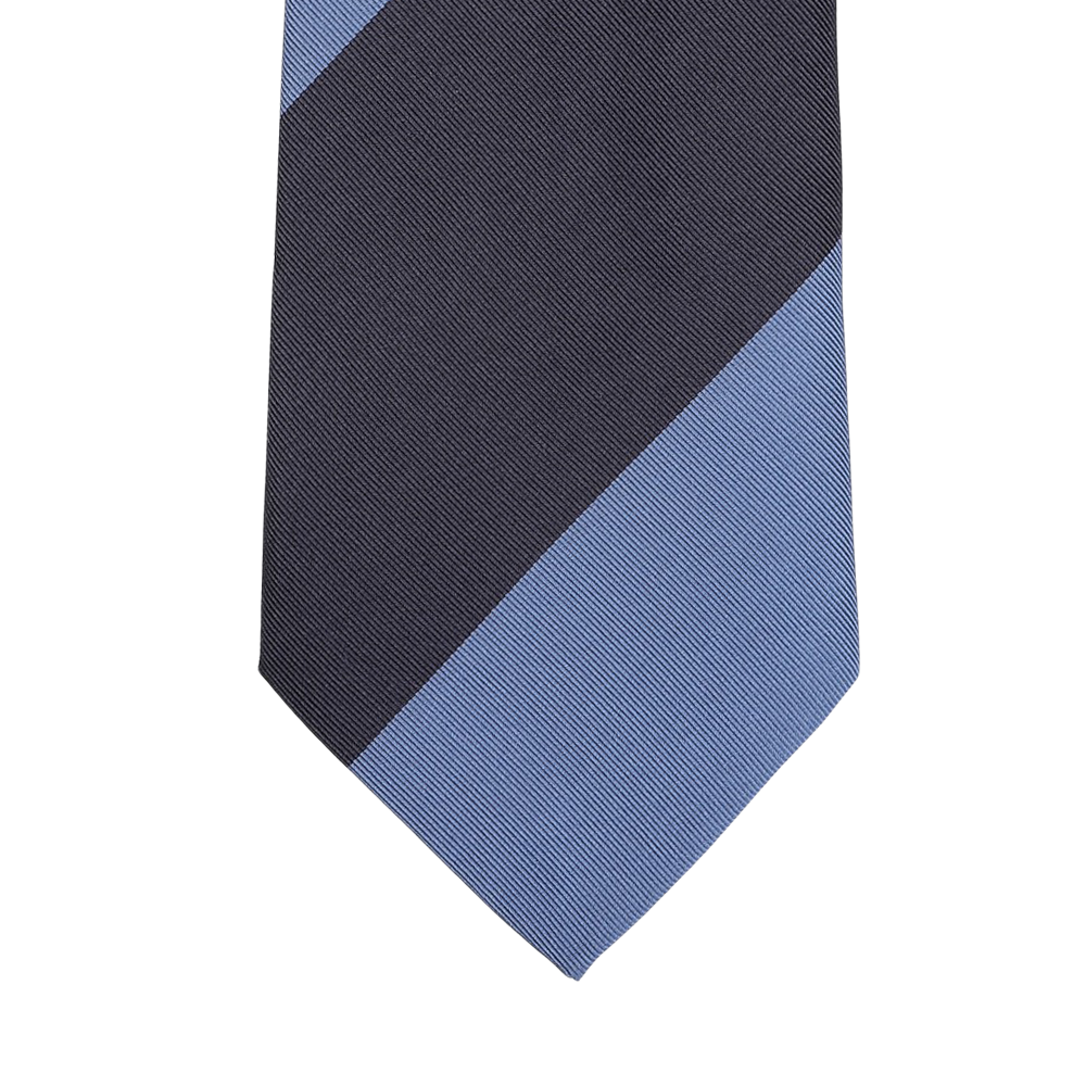 A close-up of the Seaward & Stearn Navy Blue Striped Silk Tie highlights a diagonal design with navy blue and dark gray sections against a light gray background, exemplifying the elegance of this handmade silk necktie.