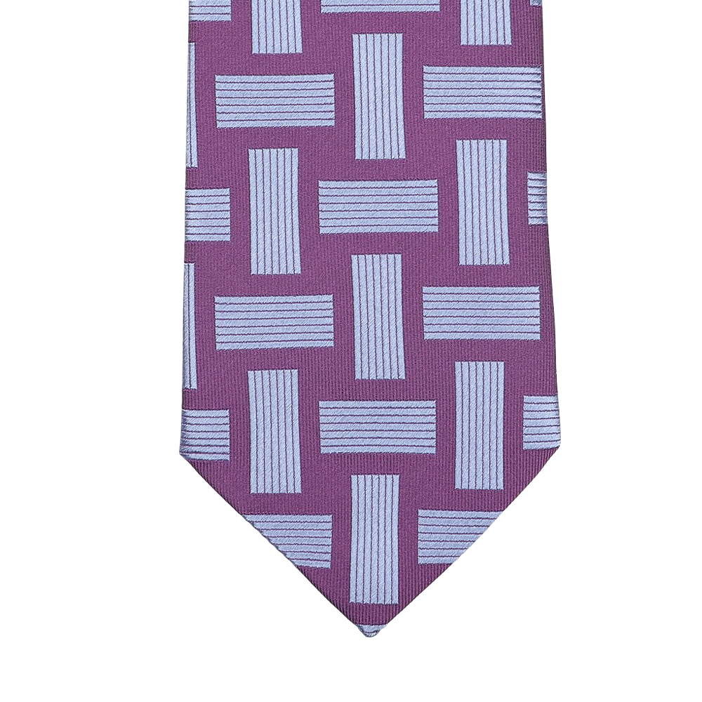 The Purple Geometric Printed Silk Tie by Seaward & Stearn showcases a design of interlocking blue rectangles and stripes and is handmade in England.