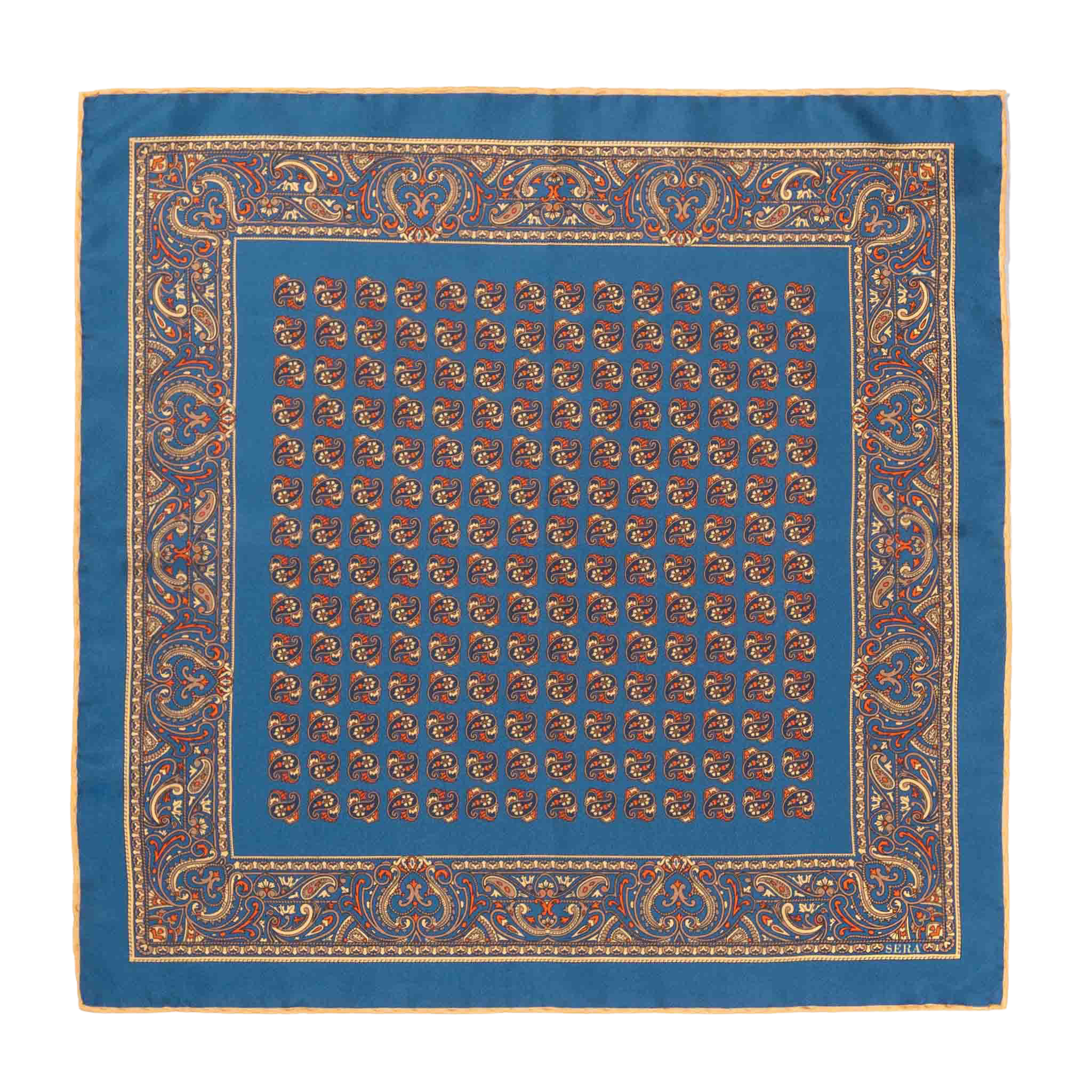 Introducing the Nutmeg Montepulciano Silk Pocket Square by Sera Fine Silk—a luxurious accessory featuring a distinctive blue pattern with a repeated central design and an intricate border adorned with ornamental motifs. Perfect for the season, this silk pocket square boasts elegant hand-rolled edges.