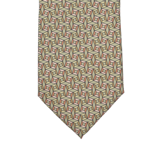 Close-up of the Asparagus Green Geometrical Printed Silk Lined Tie by Stefano Cau, featuring a pattern of interlocking cubes crafted from luxurious Italian Como silk in beige, red, and grey tones.