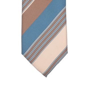 The Beige Herringbone Striped Silk Lined Tie by Stefano Cau features diagonal stripes in shades of brown, blue, and cream, crafted from luxurious Italian Como silk.