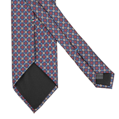 Crafted from luxurious Italian Como silk, the Blue Burgundy Flower Printed Silk Lined Tie by Stefano Cau boasts an eye-catching geometric design, elegantly displayed on a pristine white surface.