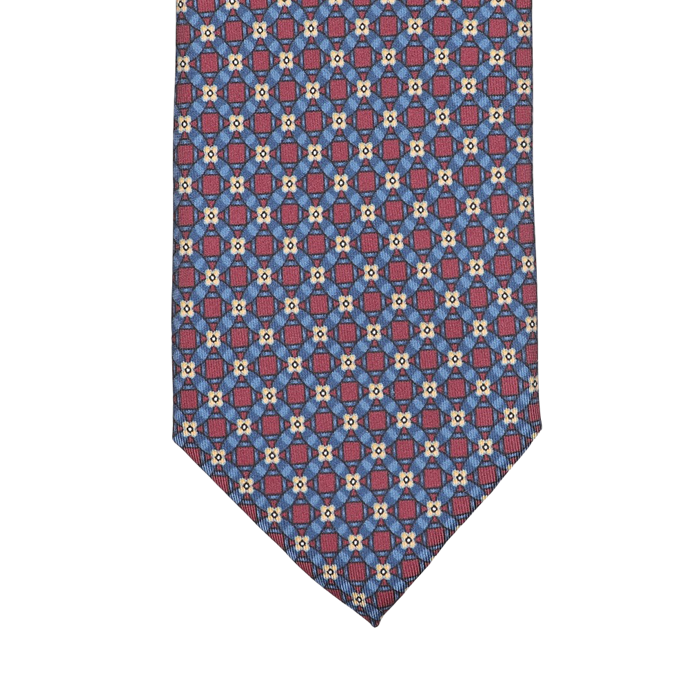 Close-up of a Stefano Cau Blue Burgundy Flower Printed Silk Lined Tie featuring a geometric design in vibrant red, blue, and white, made from luxurious Italian Como silk.