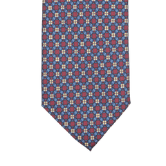 Close-up of a Stefano Cau Blue Burgundy Flower Printed Silk Lined Tie featuring a geometric design in vibrant red, blue, and white, made from luxurious Italian Como silk.