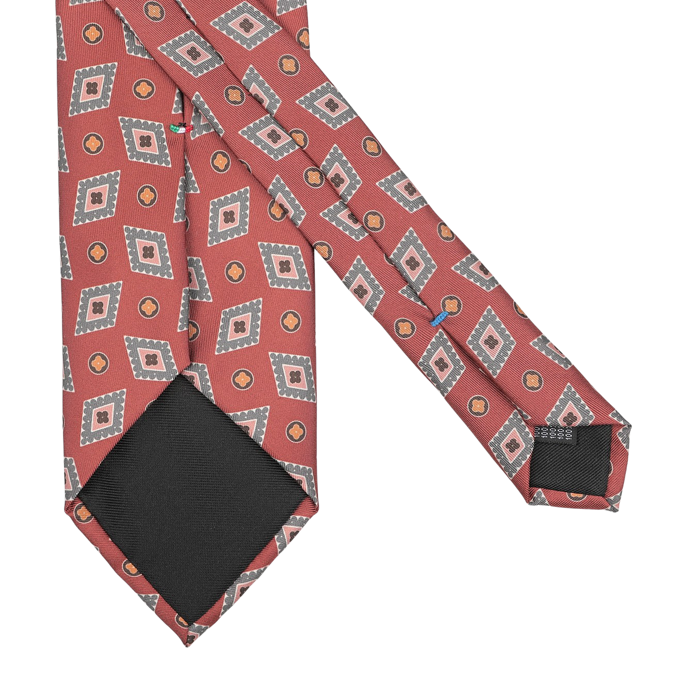 Crafted by Stefano Cau, this Brick Red Diamond Printed Silk Lined Tie is a remarkable piece featuring intricate geometric patterns and small circular accents artfully displayed on a crisp white background.