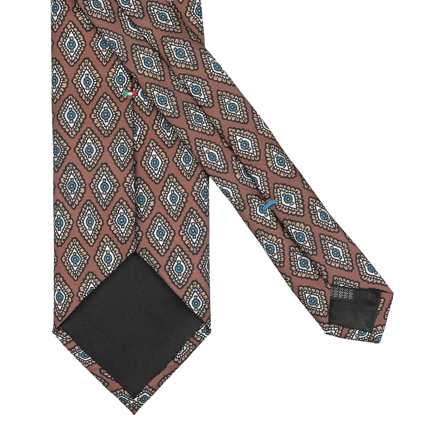 A tie from Stefano Cau featuring a luxurious Italian Como silk with a cinnamon brown base and a repeating geometric diamond pattern in blue, white, and black, laid flat.