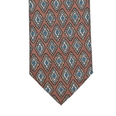 Close-up of the Stefano Cau Cinnamon Brown Medallion Printed Silk Lined Tie, featuring a geometric pattern in brown, blue, and beige tones crafted from luxurious Italian Como silk.