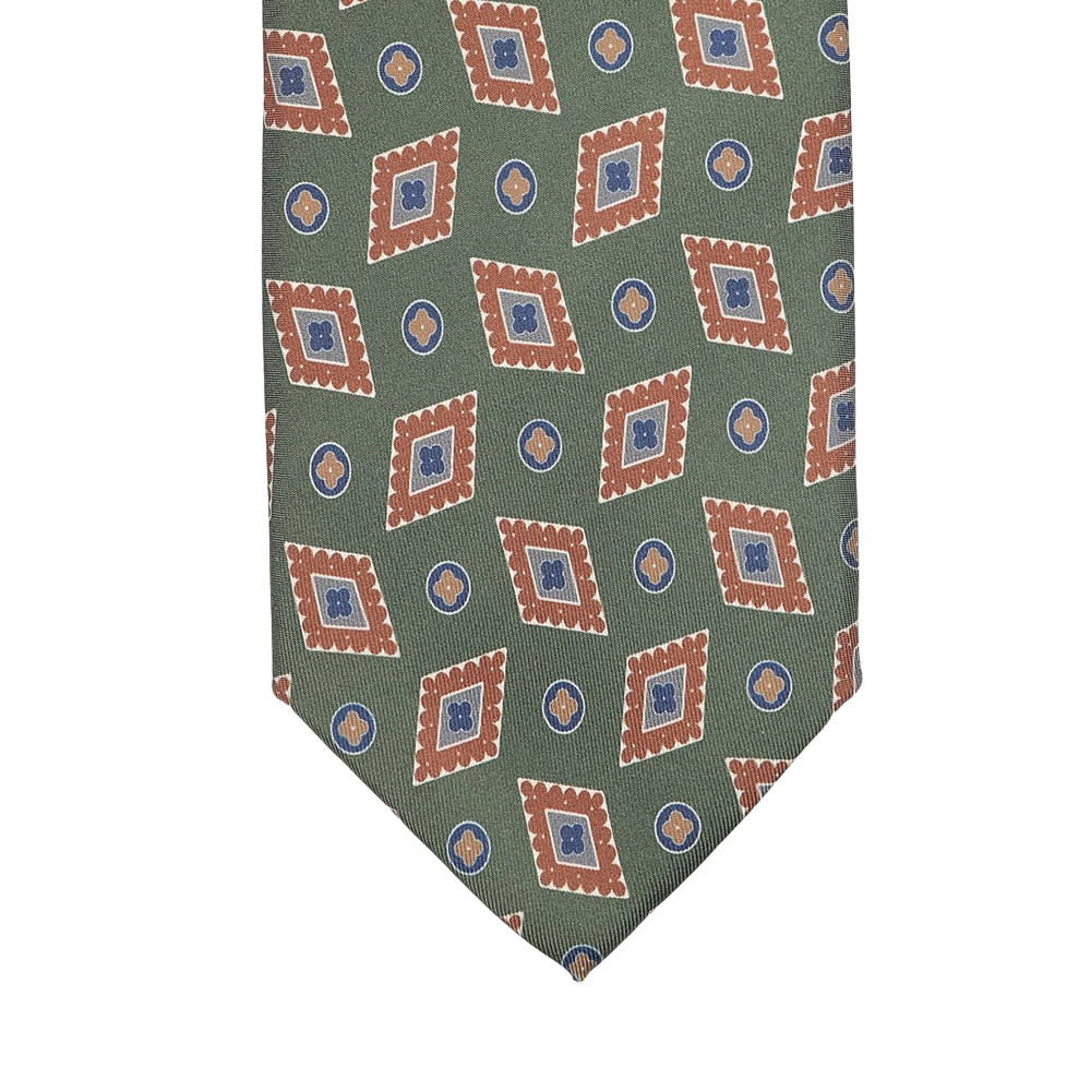 Made from luxurious Italian Como silk, the Green Diamond Printed Silk Lined Tie by Stefano Cau features a geometric design with brown-bordered diamonds and small blue circles.