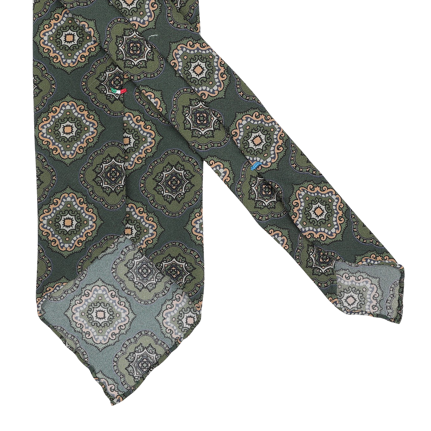 The Green Medallion Printed Silk Unlined Tie by Stefano Cau, made from the finest Italian Como silk, features an intricate geometric pattern with orange, white, and black accents and is displayed on a white surface.