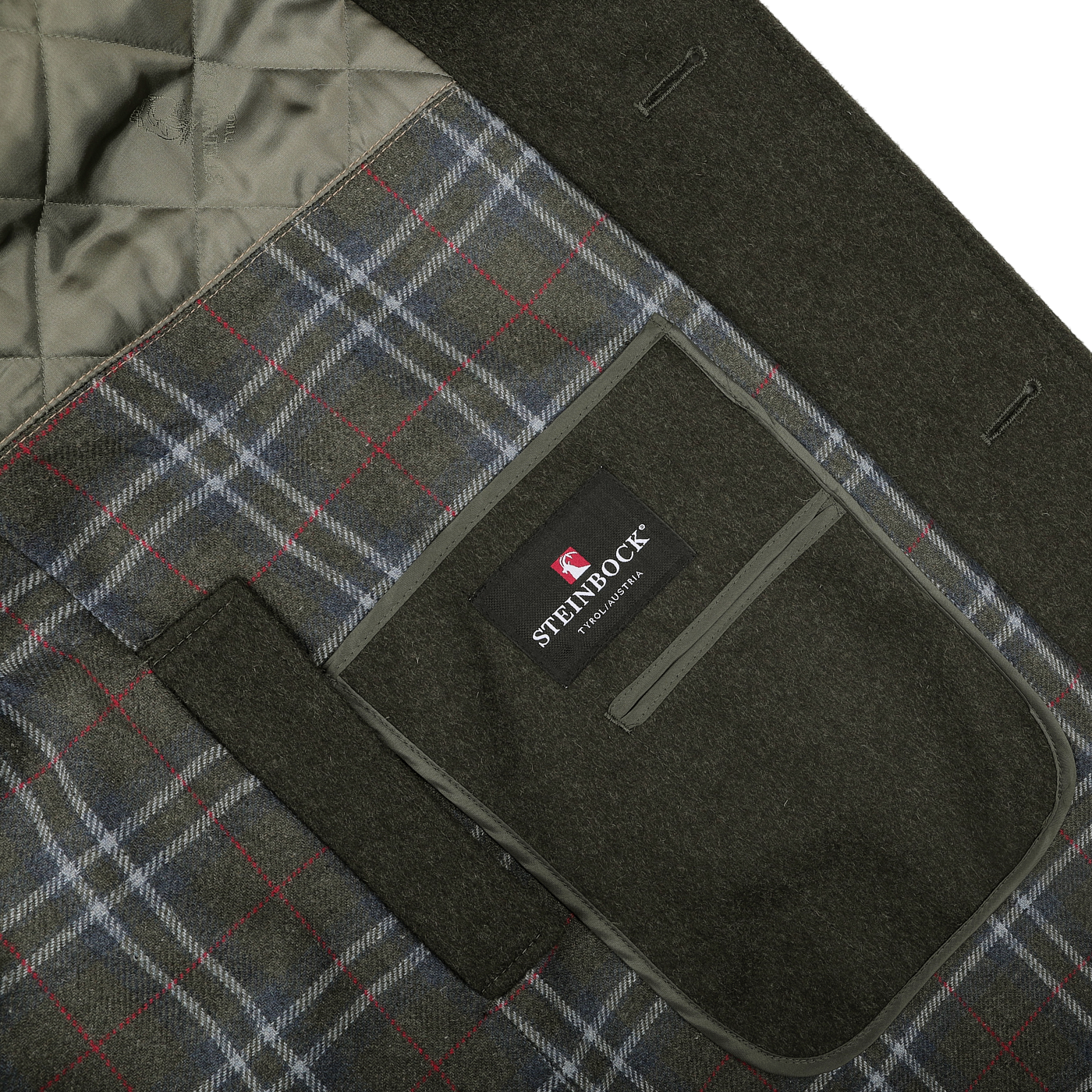 Close-up of a coat interior displaying a quilted lining and a fabric tag with the "Steinbock" label. The Dark Green Wool Alpaca Loden Coat, crafted from a wool-alpaca blend, features a plaid pattern in gray, red, and blue tones.