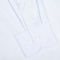 Close-up of a Light Blue Cotton Twill Fitted Body Shirt sleeve by Stenströms, featuring white buttons and a subtle vertical stripe pattern. Made from pure cotton twill, this shirt offers a fitted body cut for an elegant silhouette.