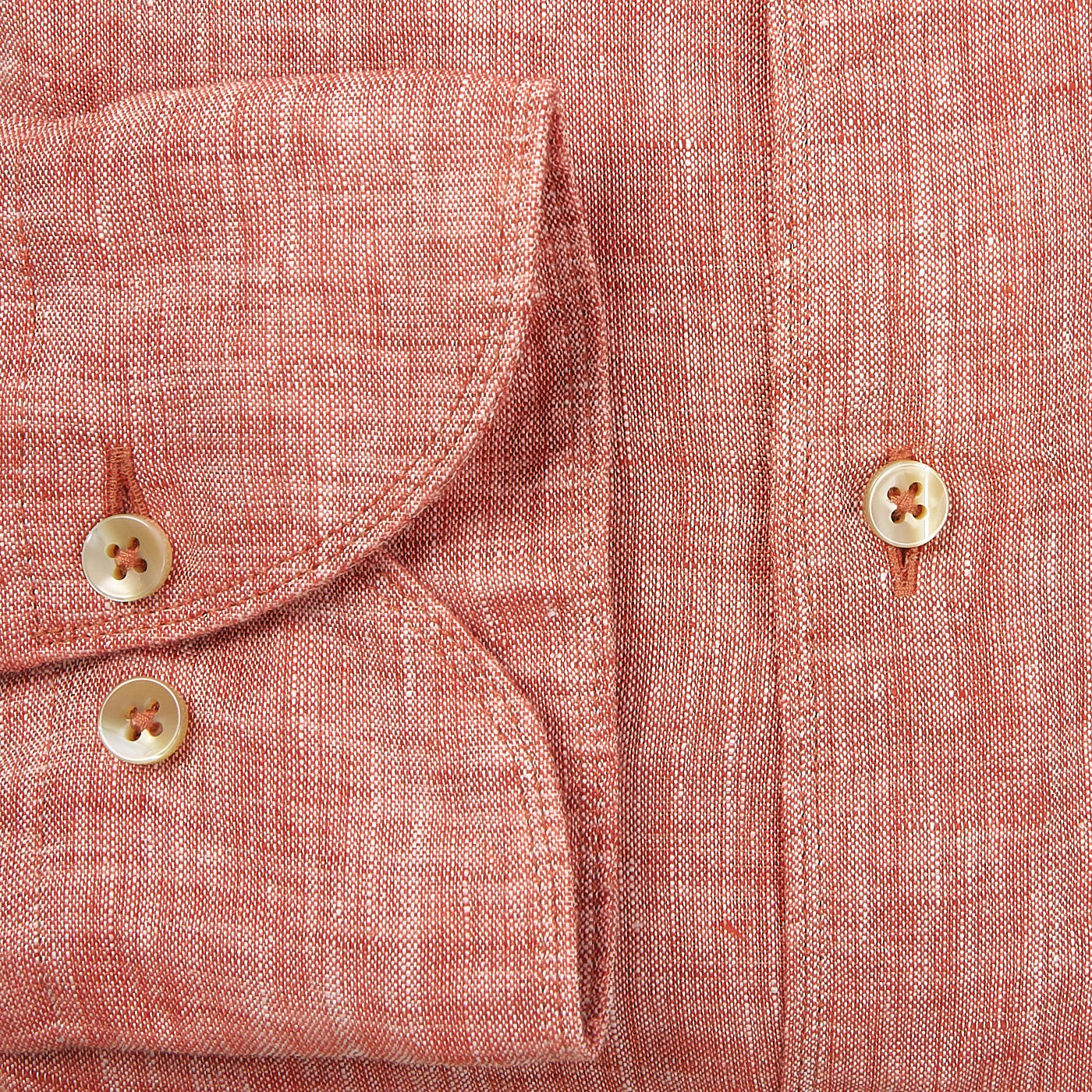 A close-up of a Stenströms Matte Red Linen Cutaway Slimline Shirt with buttons and a slim fit.