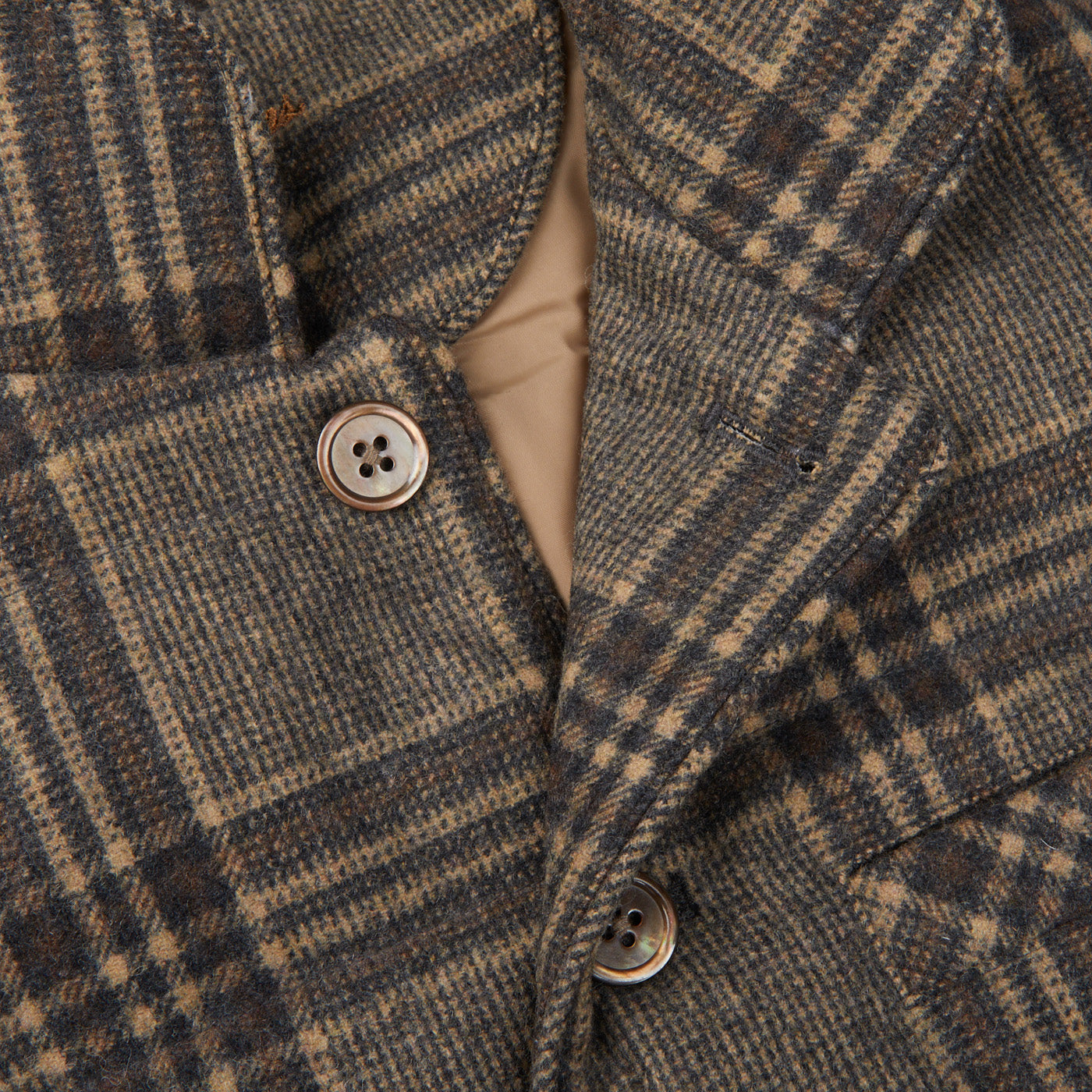 A Stenströms beige checked wool down padded gilet.