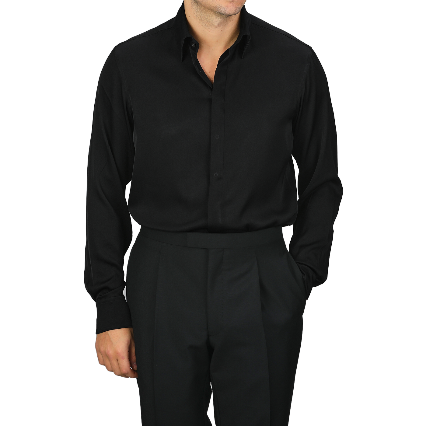 A person dressed in the Stenströms Black Silk Fitted Body Shirt and matching black pants, with one hand in a pocket.