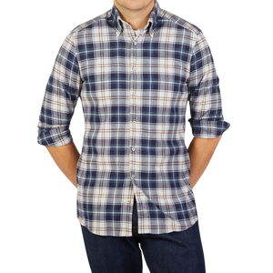 A man wearing a Blue Checked Cotton Flannel Slimline Shirt by Stenströms.