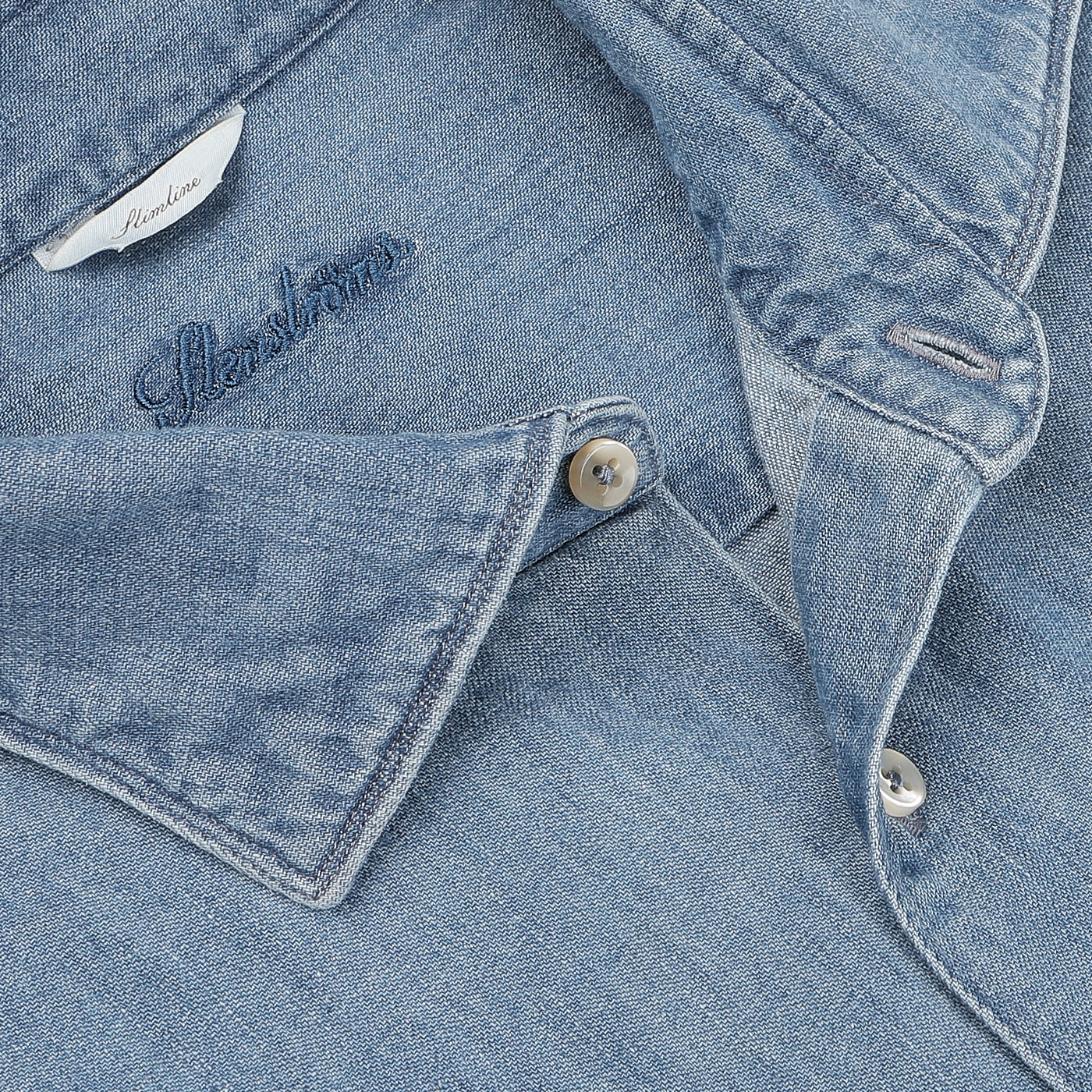 Close-up of the Blue Washed Cotton Denim Slimline Shirt by Stenströms, showcasing its pure cotton denim fabric, visible buttons, and intricate stitching details.