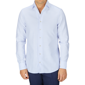 Man in a Stenströms Blue White Striped Cotton Slimline shirt with a cut-away collar and dark trousers.
