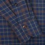 Close-up of a Dark Blue Checked Flannel Slimline BD Shirt sleeve by Stenströms, made from brushed cotton twill fabric, featuring two buttoned cuffs.