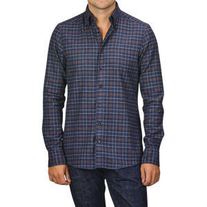 A person is wearing a Dark Blue Checked Flannel Fitted Body BD Shirt from Stenströms. It is tucked into dark jeans. The head is cropped out of the image.