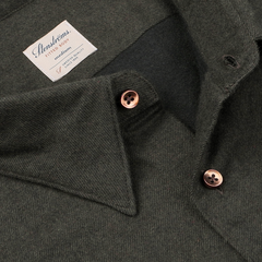 Close-up of the Dark Green Cotton Flannel Fitted Body Shirt by Stenströms, part of a capsule collection. This shirt is made from pure cotton flannel with a textured appearance and features brown buttons.