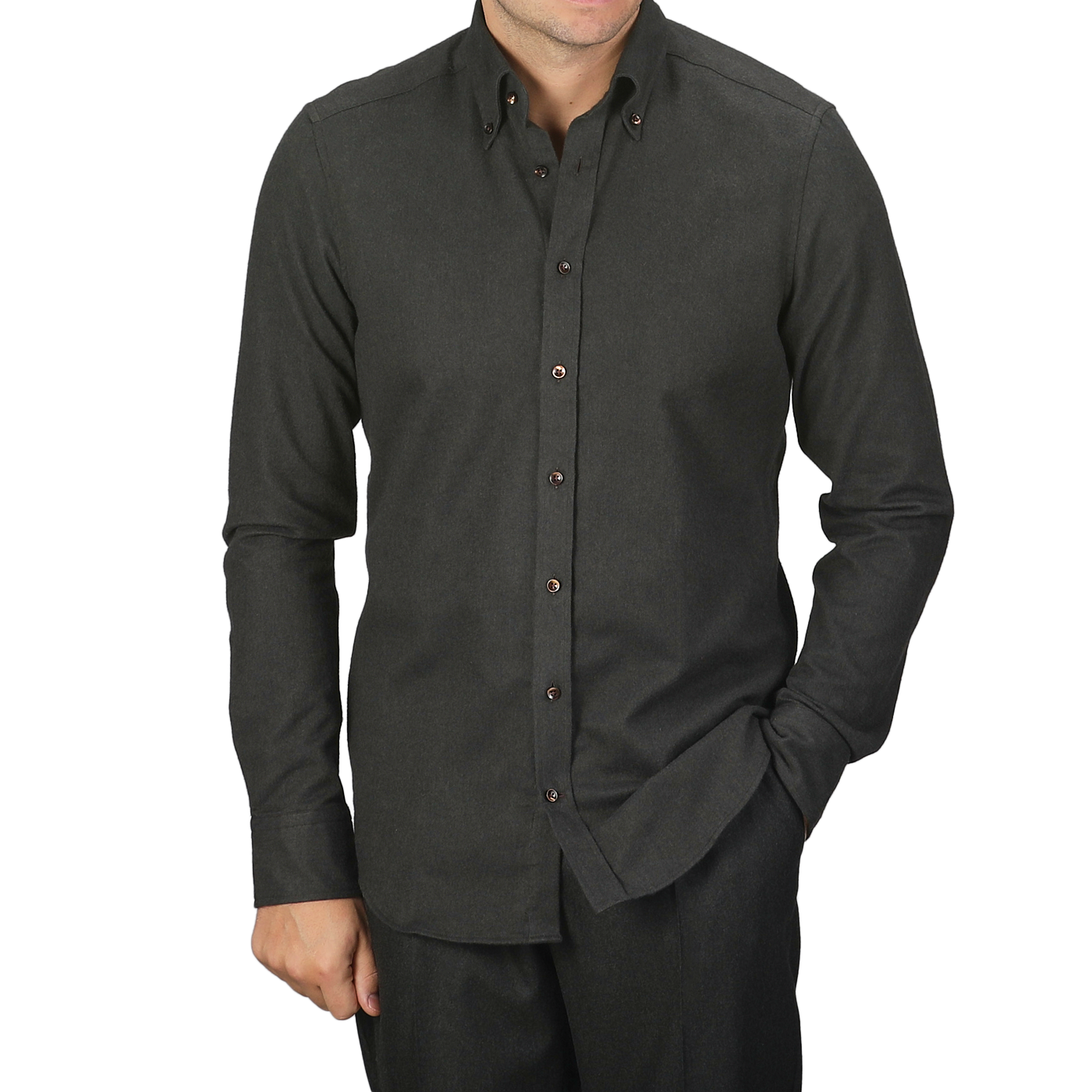 A person wearing a Stenströms Dark Green Melange Cotton Flannel Slimline Shirt with hands in pockets.