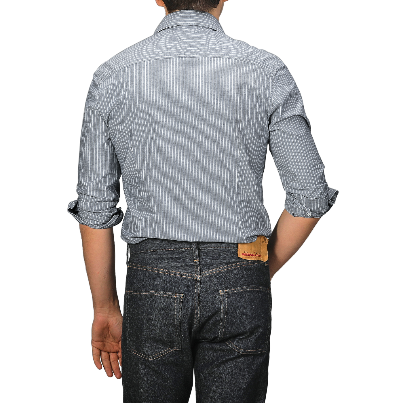 A person is seen from the back wearing a Stenströms Dark Indigo Striped Washed Cotton Slimline Shirt with dark jeans.