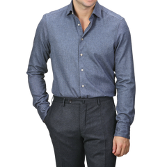 A person wearing the Stenströms Denim Blue Cotton Flannel Cut-Away Slimline Shirt and dark trousers stands against a neutral background.