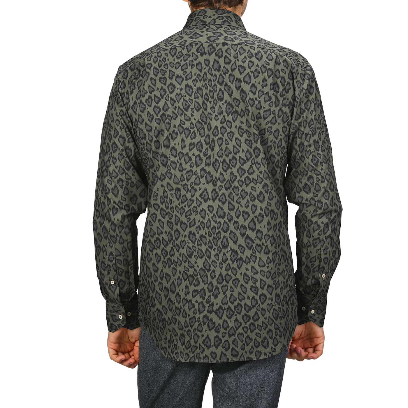 Rear view of a person wearing Stenströms' Green Animal Printed Fitted Body Shirt paired with gray pants against a plain background.