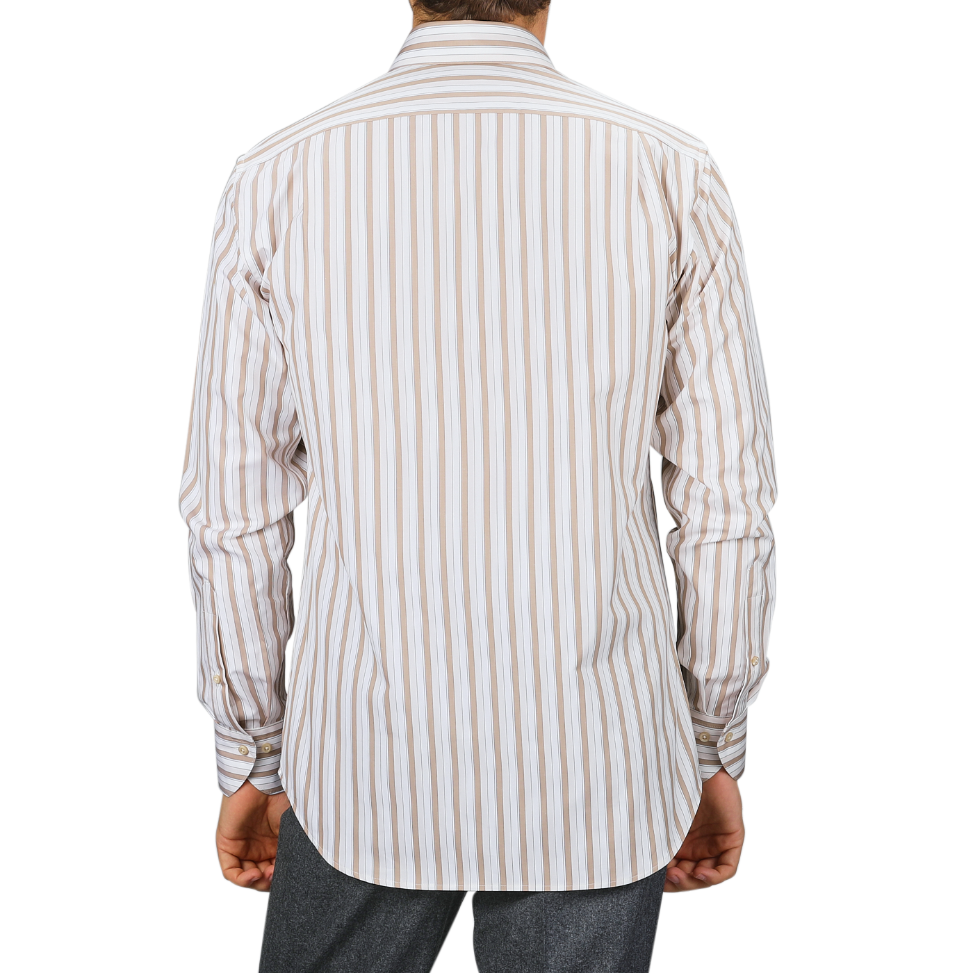 A person is seen from the back wearing the Light Beige Striped Cotton Fitted Body Shirt by Stenströms, featuring retro stripes in beige and white, paired with gray pants. The pure cotton twill fabric enhances the sleek appearance of its Fitted Body design.