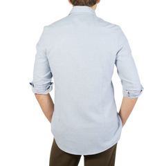 The back view of a man wearing a Stenström's Light Blue Brushed Cotton Slimline Shirt.