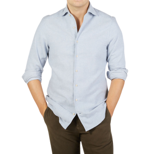 A man wearing a Stenströms Light Blue Brushed Cotton Fitted Body Shirt in a casual style.