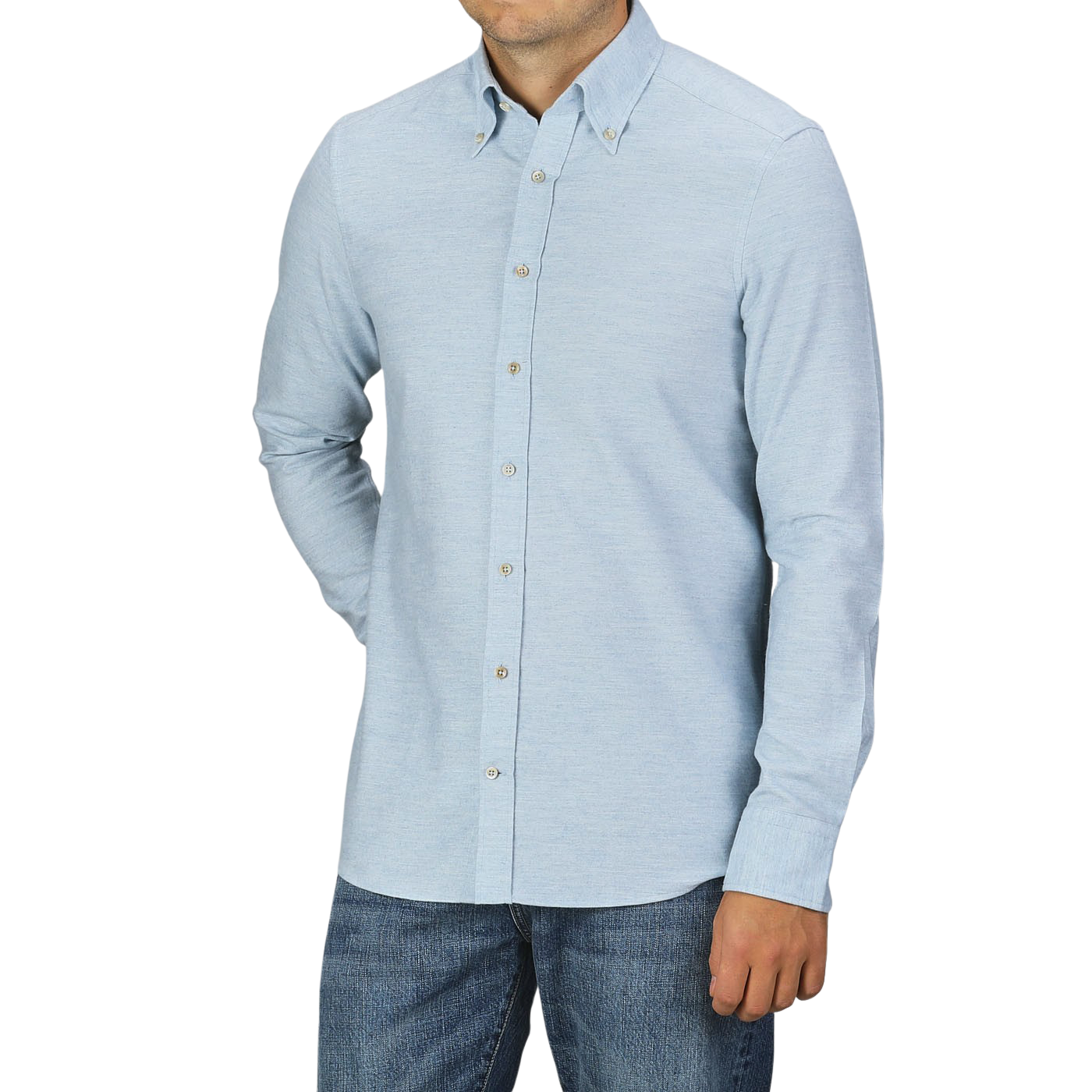 A person wearing a light blue Stenströms Light Blue Cotton Flannel Fitted Body BD Shirt and blue jeans stands against a plain gray background. The shirt has long sleeves and a collar, made from brushed cotton twill for a comfortable yet stylish look.