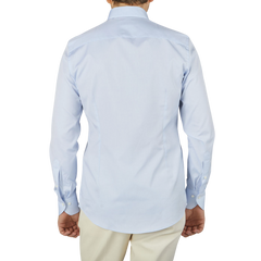 The back view of a man wearing a Light Blue Cotton Oxford BD Fitted Body Stenströms shirt.