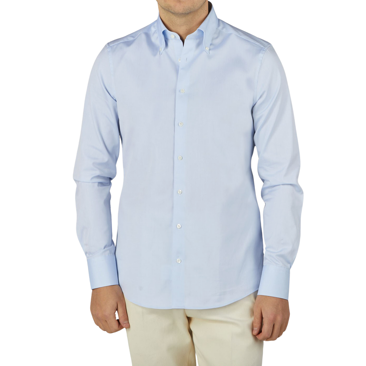 A man wearing a Stenströms Light Blue Cotton Oxford BD Slimline Shirt and tan pants.