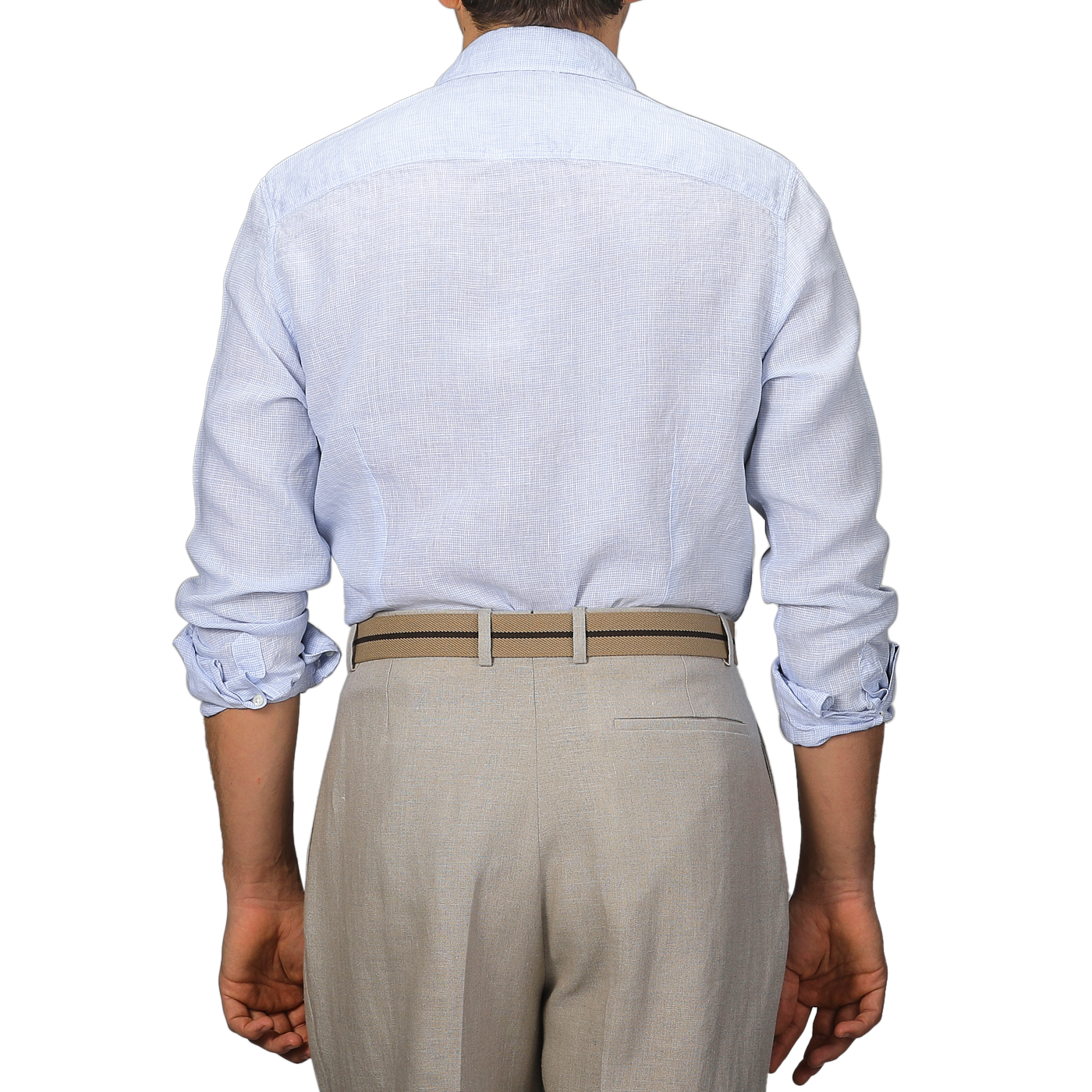 A person is seen from the back in a Stenströms Light Blue Micro-Checked Linen Slimline Shirt, sleeves rolled up and paired with beige trousers, epitomizing effortless summer style.