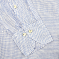 Close-up of a Stenströms Light Blue Micro-Checked Linen Fitted Body Shirt cuff, designed as a summer essential, with two white buttons for a perfect fit.