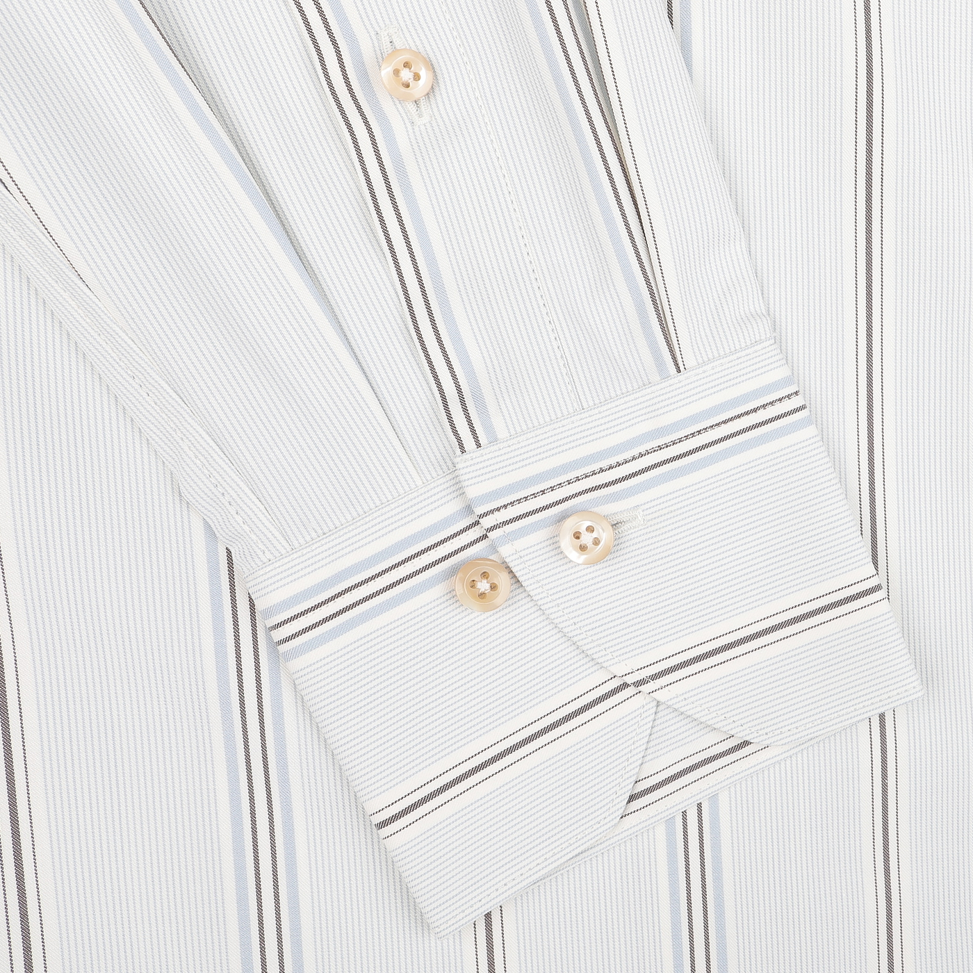 Close-up of the Stenströms Light Blue Striped Cotton Fitted Body Shirt, featuring buttoned cuffs and beige buttons, crafted in smooth cotton twill.