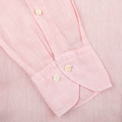 Close-up of the Light Pink Linen Cutaway Slimline Shirt from Stenströms, highlighting its cuff with two cream-colored buttons and visible stitching. This design perfectly blends style and comfort, making it an ideal summer essential.