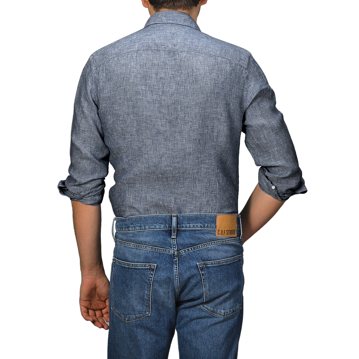 A person wearing a Mid Blue Linen Cutaway Slimline Shirt by Stenströms and accompanying jeans is shown from the back against a plain background.