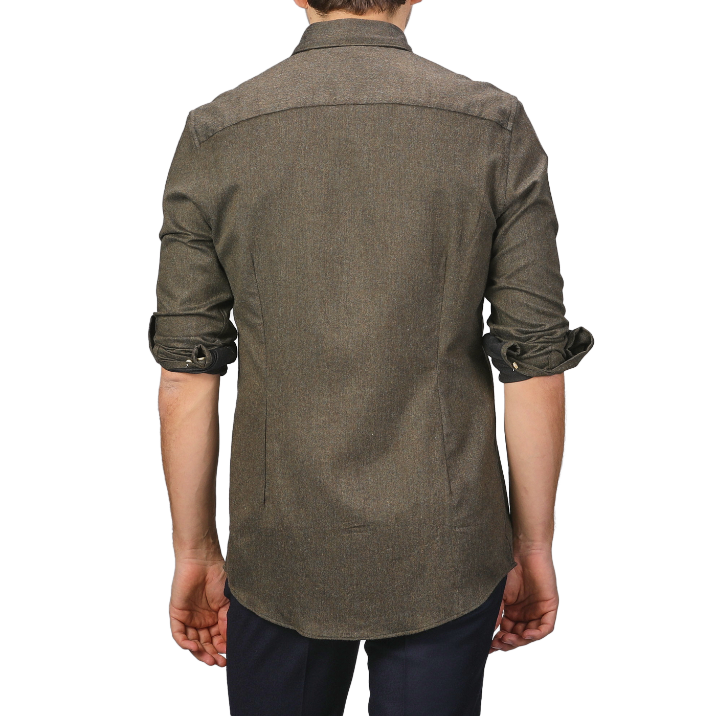 The image shows the back of a person wearing a slimline cut, long-sleeved shirt with rolled-up sleeves and dark pants. The shirt, the Moss Green Cotton Flannel Cut-Away Slimline Shirt by Stenströms, crafted from brushed cotton twill, adds a touch of sophistication to the casual look.