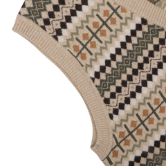 Close-up of the Taupe Beige Merino Wool Patterned Slipover by Stenströms, showcasing a geometric pattern in green, brown, black, and white.