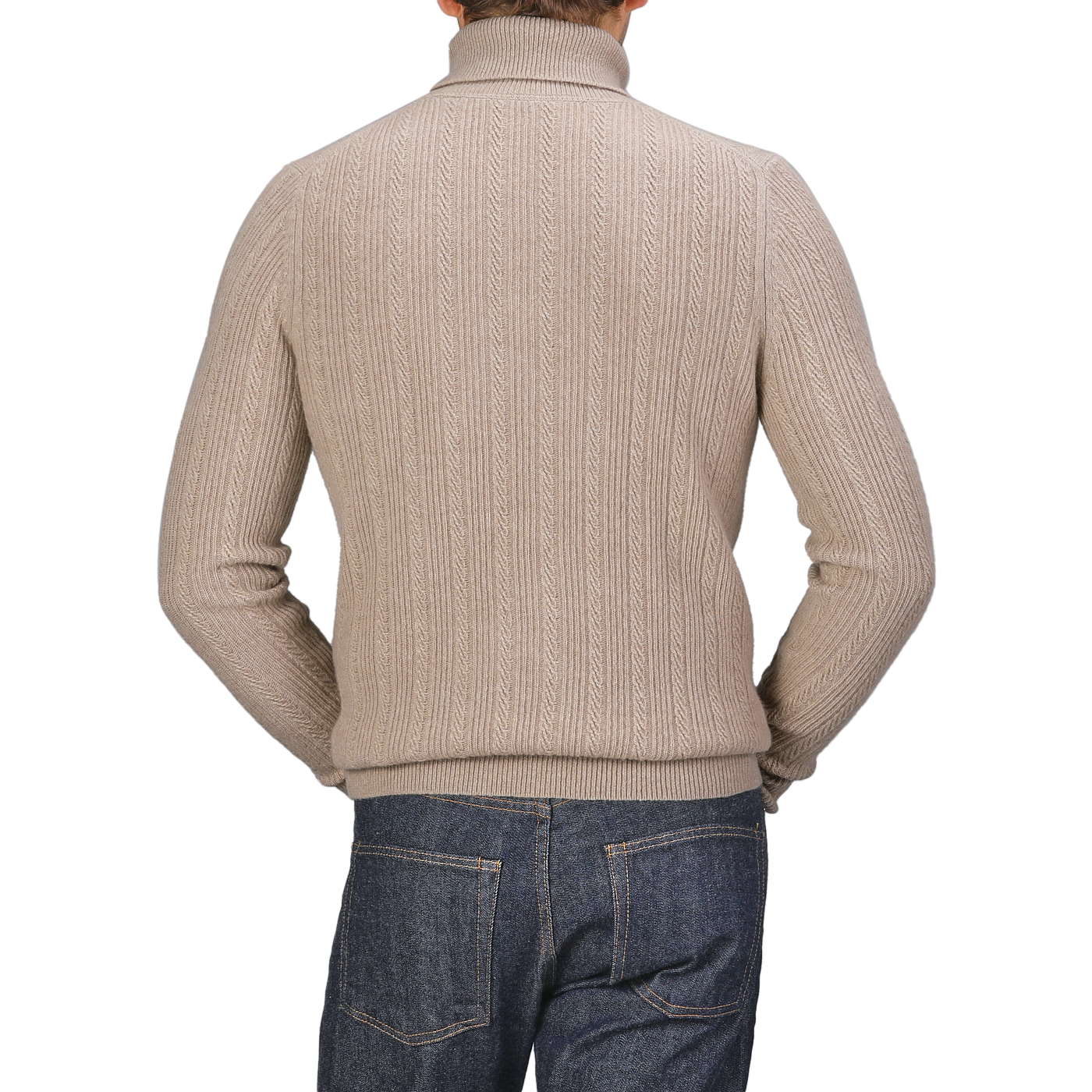 Rear view of a person wearing the Taupe Beige Structured Merino Rollneck by Stenströms, potentially part of a versatile capsule collection, paired with blue jeans.