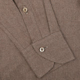 Close-up view of the sleeve on the Stenströms Taupe Brown Cotton Flannel Fitted Body BD Shirt, featuring buttoned cuffs with two beige buttons.