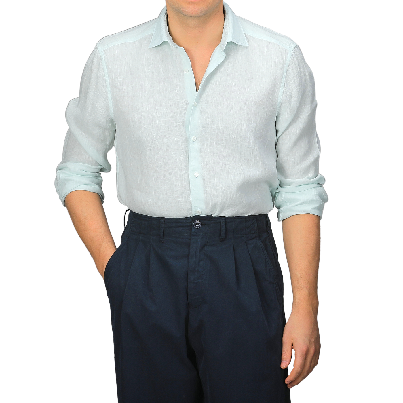 A man models the Stenströms Turquoise Linen Cutaway Slimline Shirt, sleeves rolled up, against a plain background. Paired with black trousers, it’s the perfect effortless summer style.