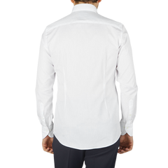 The back view of a man wearing a Stenströms White Cotton Oxford Fitted Body BD Shirt.