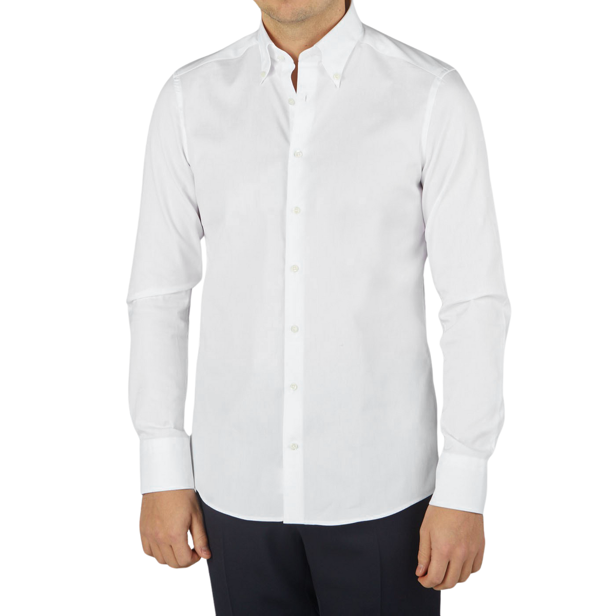 A man wearing a Stenströms White Cotton Oxford Fitted Body BD Shirt with black pants.