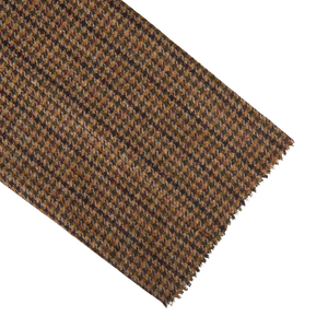 A brown houndstooth scarf on a white background made of pure wool.