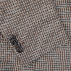 Close-up of the Brown Houndstooth Lambswool Blazer by Studio 73, crafted from super 110s lambswool and featuring four dark brown buttons neatly lined up along the edge.